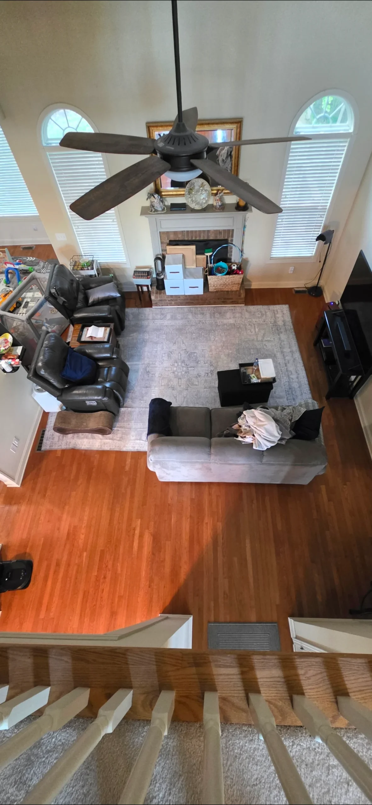 Hardwood flooring in a two-story living room